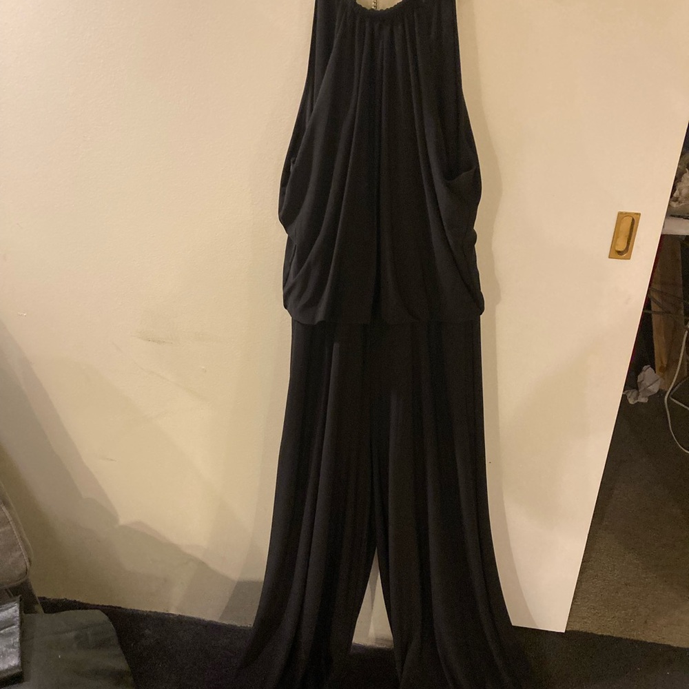 Wide leg jumpsuit size L. Elastic waist and back zipper.